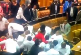 Scuffles erupt in South African parliament after opposition MPs insult President Zuma 